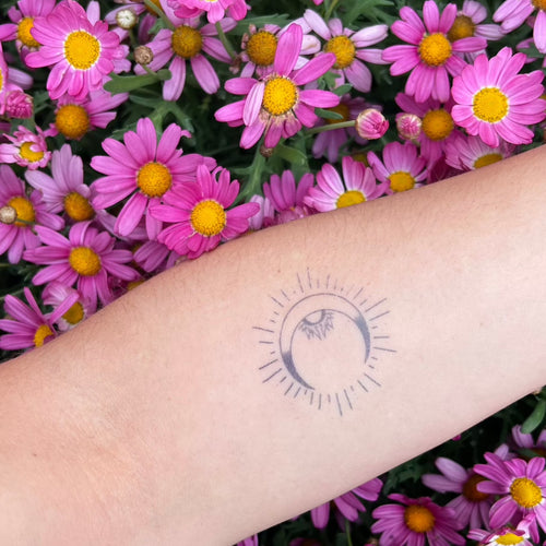 Sol-måne-tatovering