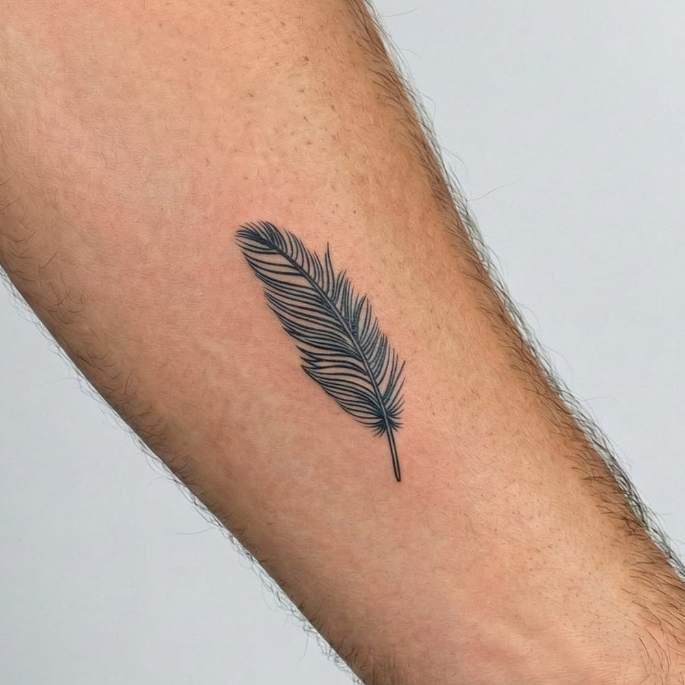 Tatouage homme plume signification liberté et nouveau départ