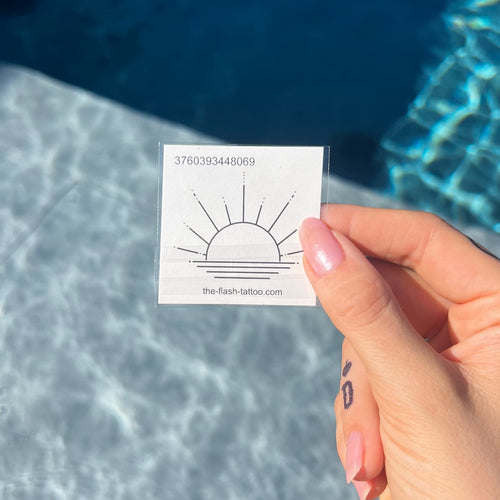 Tatouage éphémère soleil couchant minimaliste
